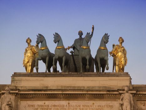 Statues group on the top of the triump arch of the Louvre Carousel in Paris
