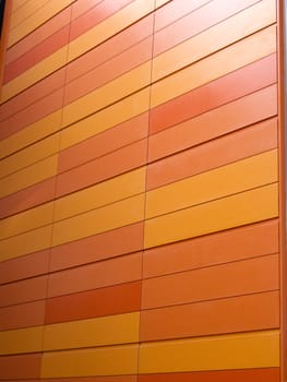 Wall with textured orange blocks