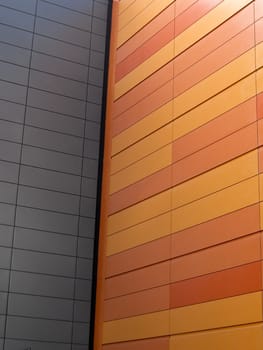 White block wall joining orange block wall