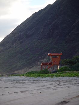 A life guard shack sits on the beach in Hawaii