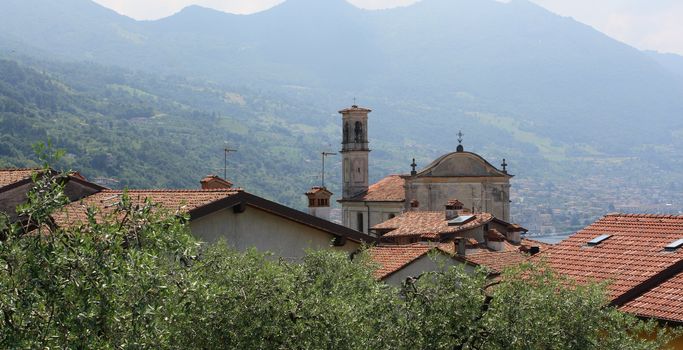 View on small village Sale Marasino with church