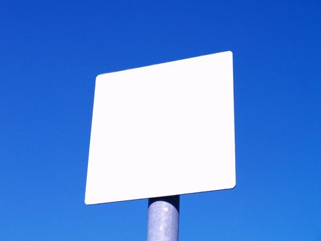 white sign and sky 