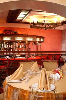 Bar rack with chairs at restaurant
