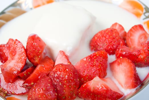 Strawberries and yogurt.Cottage cheese