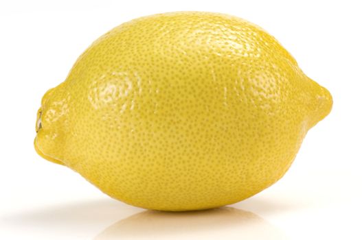 Close-up of a lemon on a white background