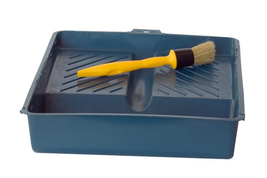 Brush and tray for painting isolated on a white background.