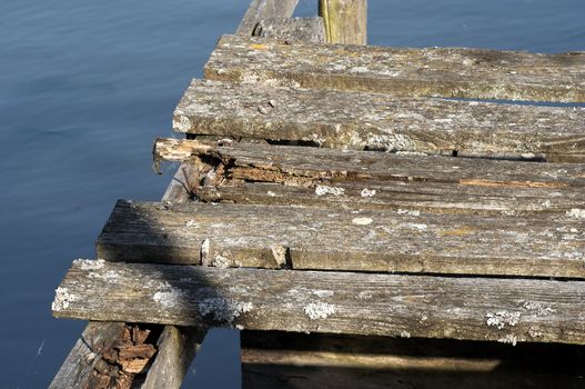 old moddering pier at a small lake