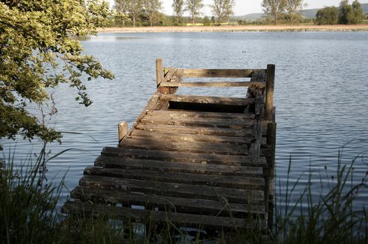 old moddering pier at a small lake