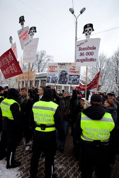RIGA, LATVIA, MARCH 16, 2010: Protestors shouts against Commemoration of the Latvian Waffen SS unit or Legionnaires.The event is always drawing crowds of nationalist supporters and anti-fascist demonstrators. Many Latvians legionnaires were forcibly called to join the Latvian SS Legion.