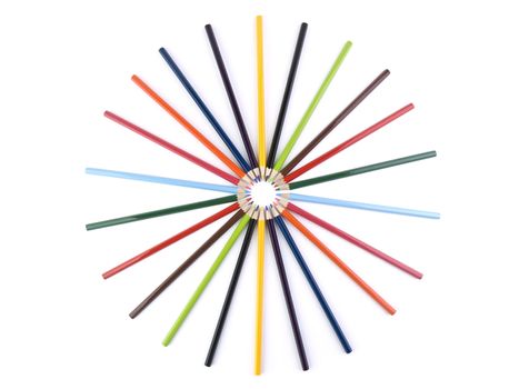 A circle formed by several colored pencils. Isolated on white.