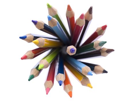 Top view of assorted color pencils disposed in a circle.