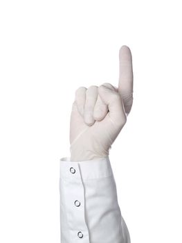 A doctor's hand makes the number one or points up.