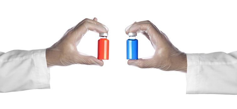 A doctor holds two vials with his latex gloves on. Isolated on white.