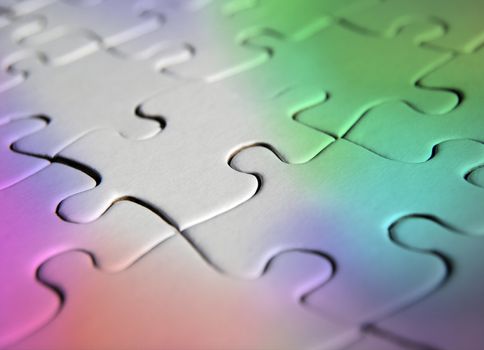 Plain jigsaw puzzle with rainbow colour overlay