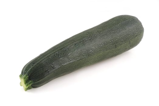 One zucchini isolated on a white background.