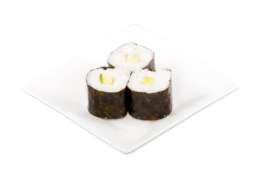 a square white plate with three pieces of sushi