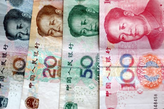 Chinese RMB currency, different banknotes and coins.
