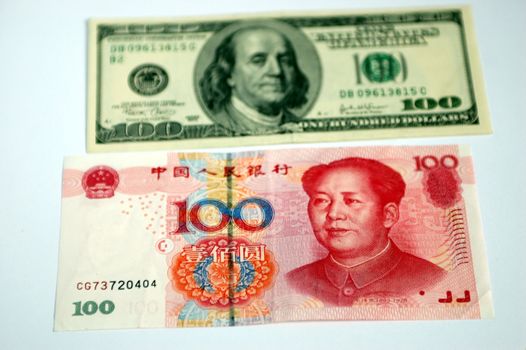 Chinese money, RMB banknote together with american dollar banknote.