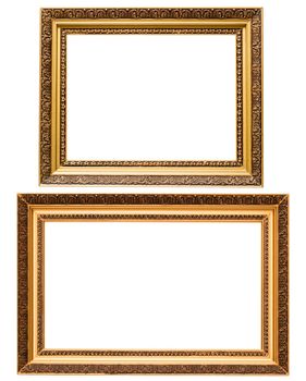 Two gold plated wooden picture frames isolated on white