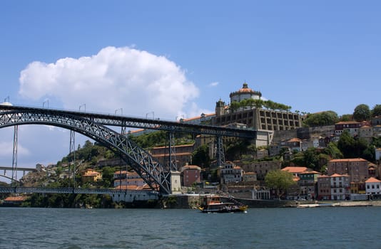 Antique fortress with bridge in Porto over blue sky