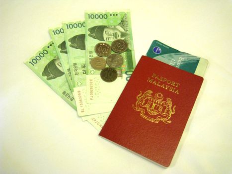 a malaysia passport and korean currency