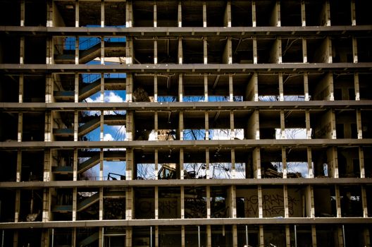 Bit of blue sky with clouds showing through an old abandonned building