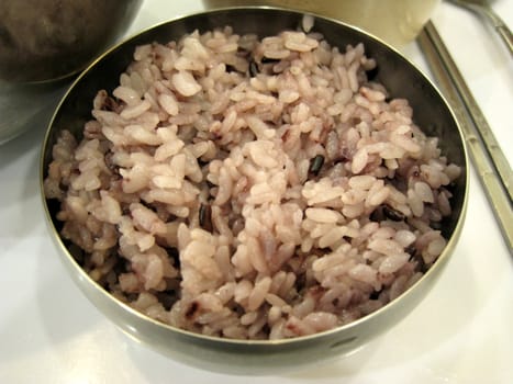 a bowl of cooked brown rice