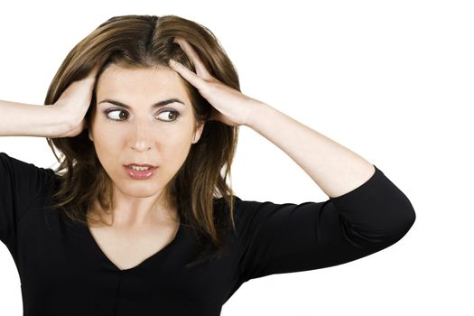 Stressed woman with hands on the head - isolated on white