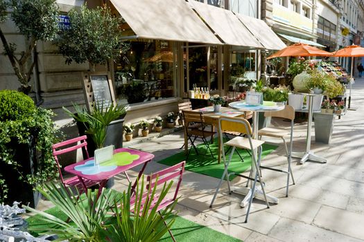 Empty street cafe at the city of Lyon, France