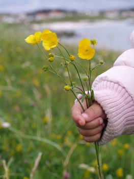 small hand with flowers