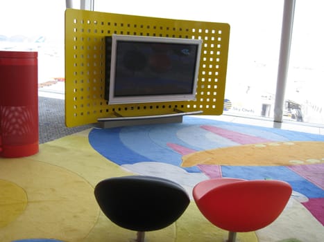 a space for children when waiting for flight in hong kong airport