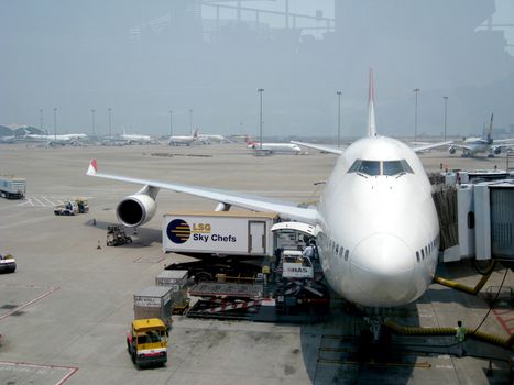 Charge and refuel airplane in airport