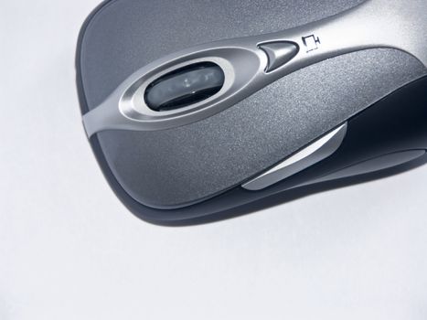 The image of the computer mouse on a homogeneous background