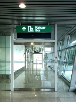 a exit sign in kuala lumpur international airport