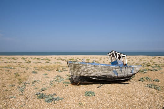 An old fishing boat on the beach at Dungeness