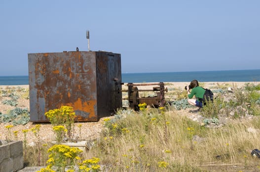 An old abandoned rusty shed on the beach