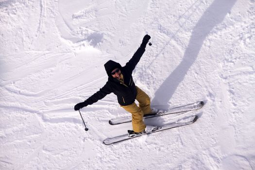 Skier on top of the mountain. Cheget Mount. Russia. Caucasus.