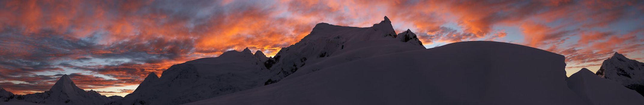 Panoramic image of sunrise over Pisco mountain, Cordillera Blanca, Peru.
