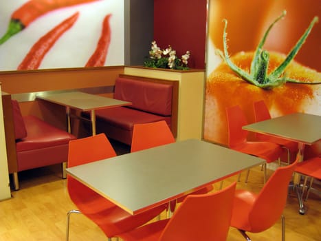 a modern set table and chair in dining place.