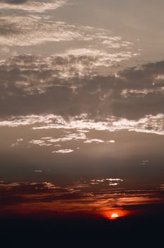 dramatic red with silver sunset over the sea