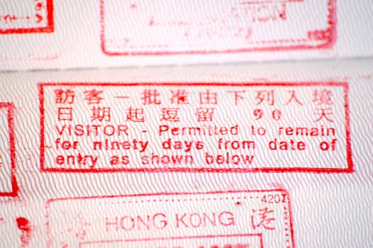 European passport full of stamps from China and Hongkong borders.