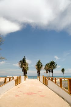 Bridge over river to beach.