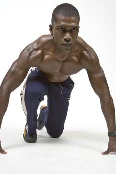 Muscular Black Man shows some musce