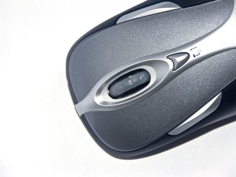 The image of the computer mouse on a homogeneous background