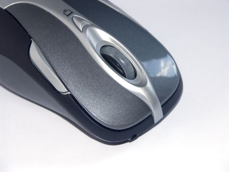 The image of the computer mouse on a homogeneous background