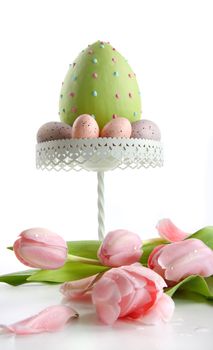 Large easter egg with pink tulips on white