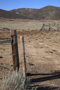Remote Wyoming cattle ranch with distant mountains