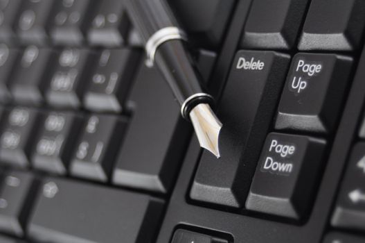 pan and black computer keyboard showing communication concept