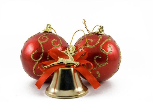 Two spheres and handbell on a white background