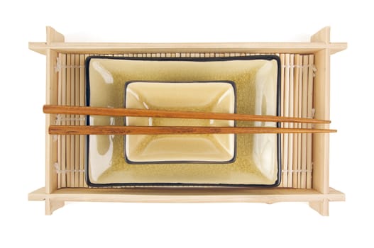 Abstract Chopsticks and Bowls Isolated on a White Background.
